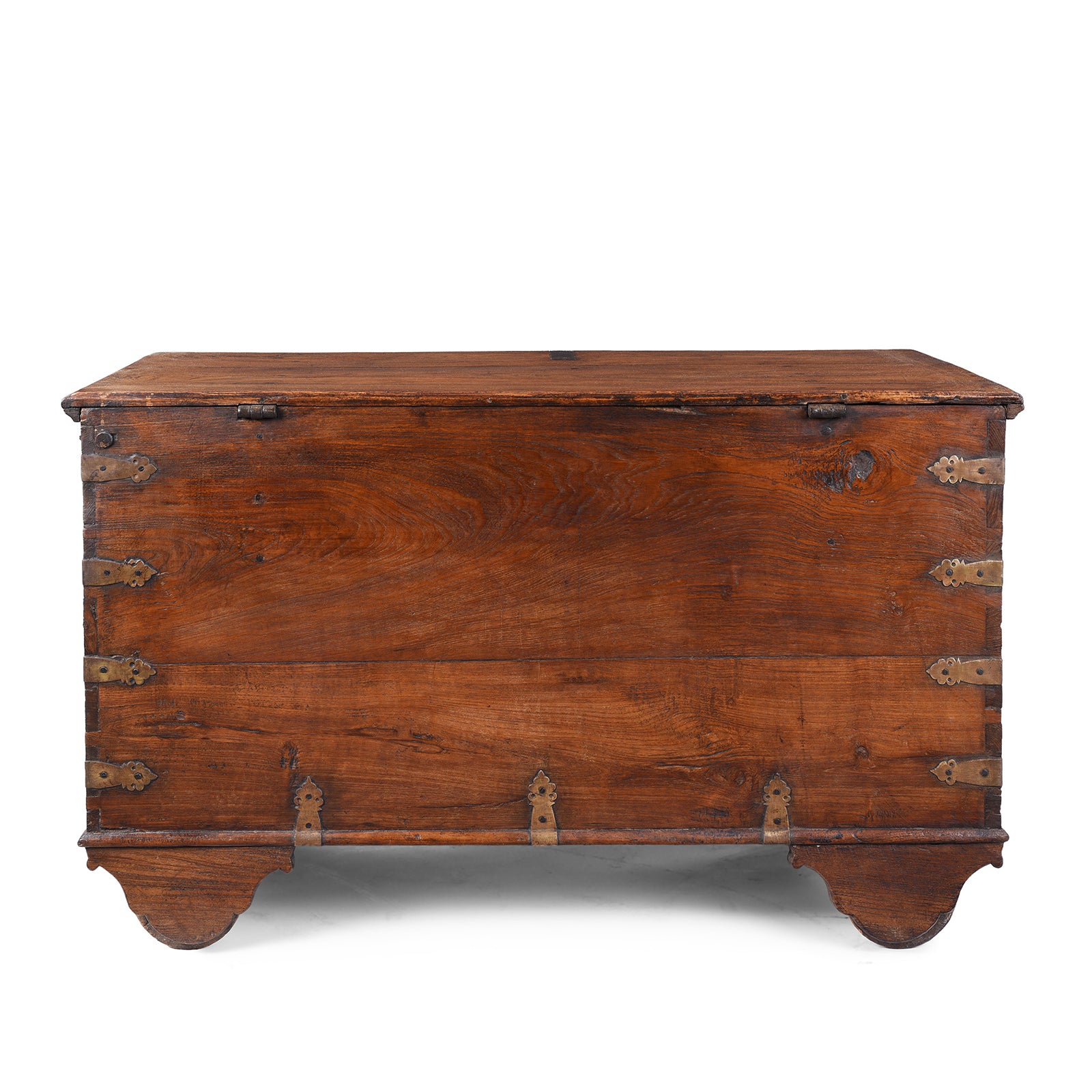 Back Of Antique mid-19th century teak chest from Gujarat with hidden wheels, carved floral feet, and original iron fittings.