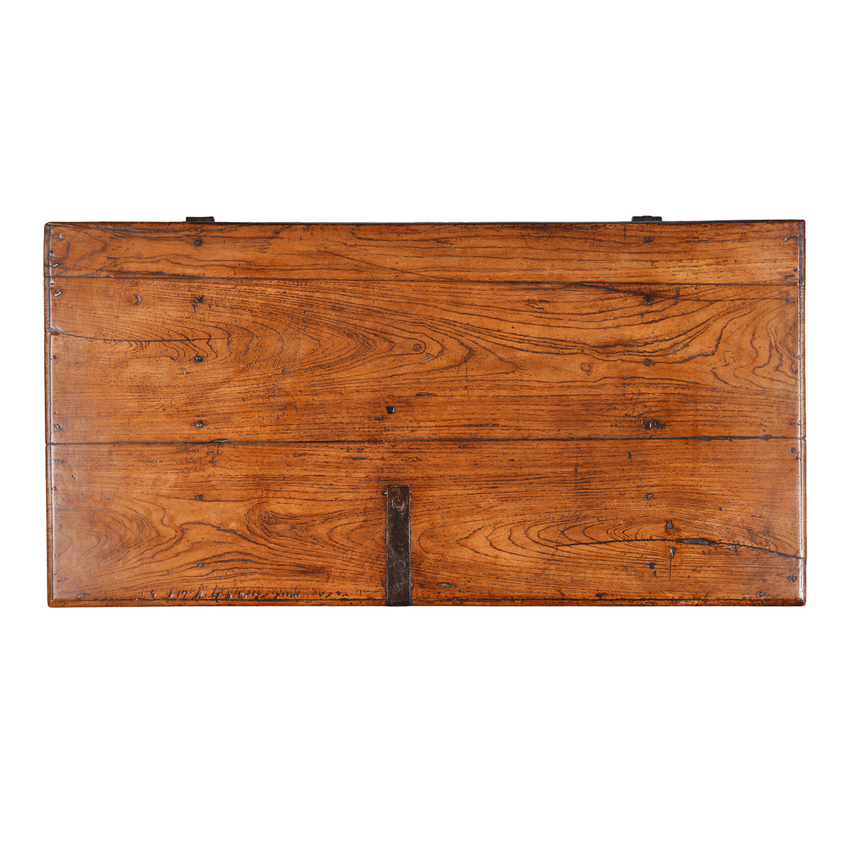 Top Down View Of Antique mid-19th century teak chest from Gujarat with hidden wheels, carved floral feet, and original iron fittings.