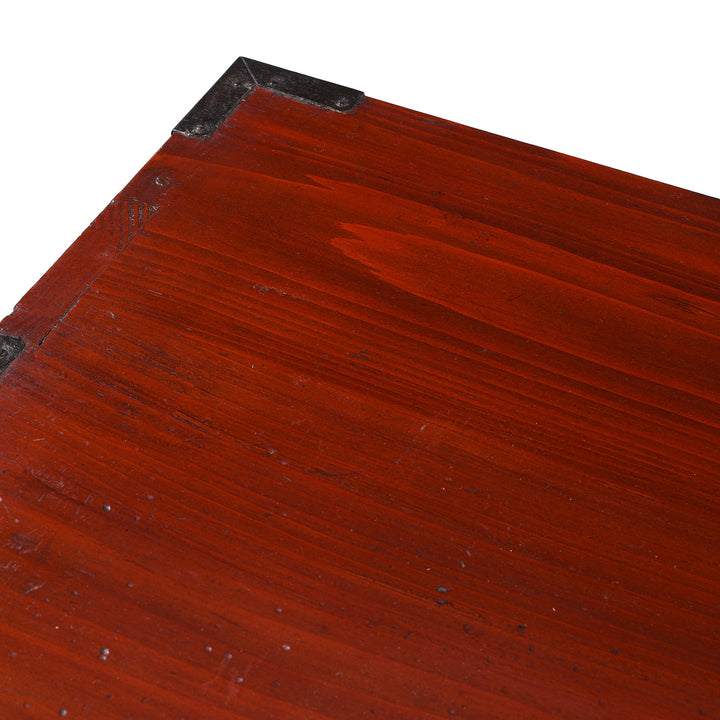 Corner Detail From Antique Japanese Tansu Chest With Lacquered Wood Finish And Ornate Iron Hardware