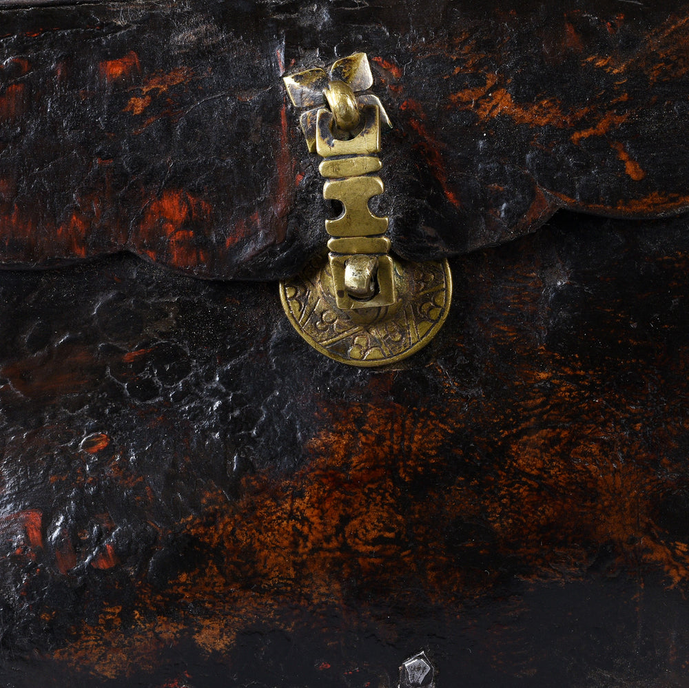 Clasp Detail From Tibetan Leather Saddle Box With Brass Script Clasp And Patinated Surface