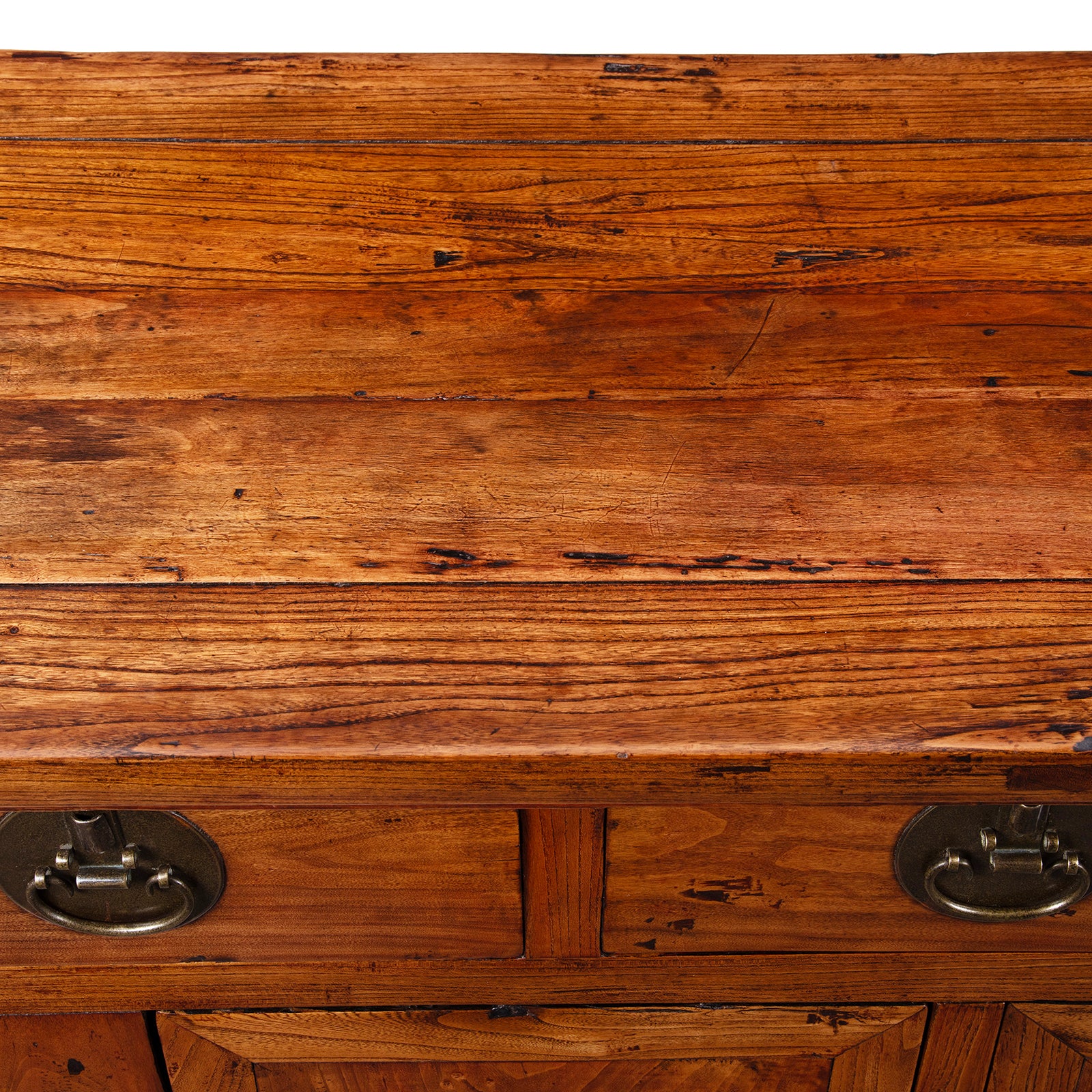 Surface Detail From Peking Ming Style Sideboard With Brass Fittings And Altar Top In Warm Patinated Wood
