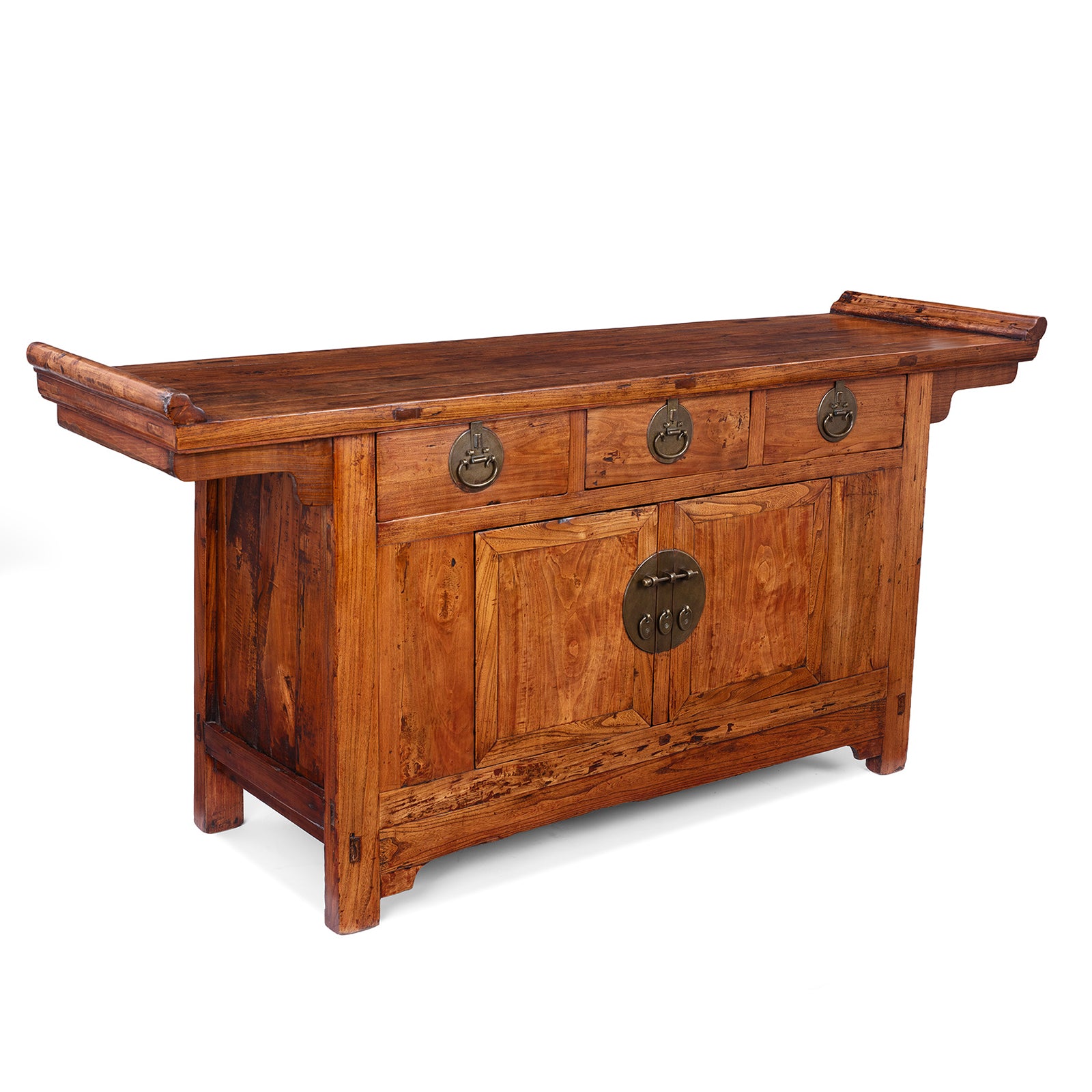 Angled View Of Peking Ming Style Sideboard With Brass Fittings And Altar Top In Warm Patinated Wood