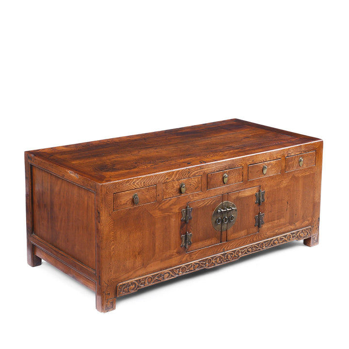 Angled VIew Of Nineteenth Century Burr Elm Chinese Kang Cabinet With Drawers Brass Hardware And Carved Apron