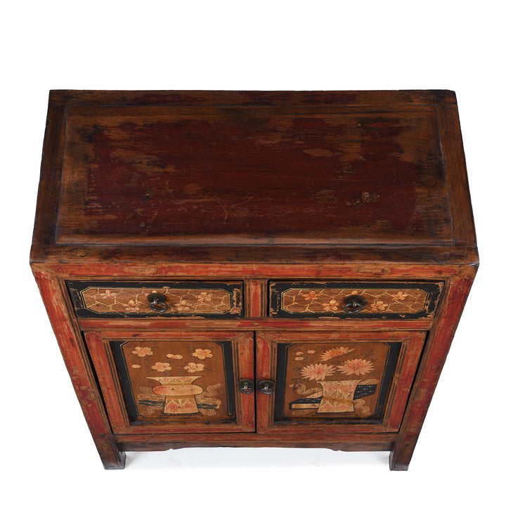 Top Down View Of Painted Mongolian Side Cabinet With Floral Panels And Two Drawers