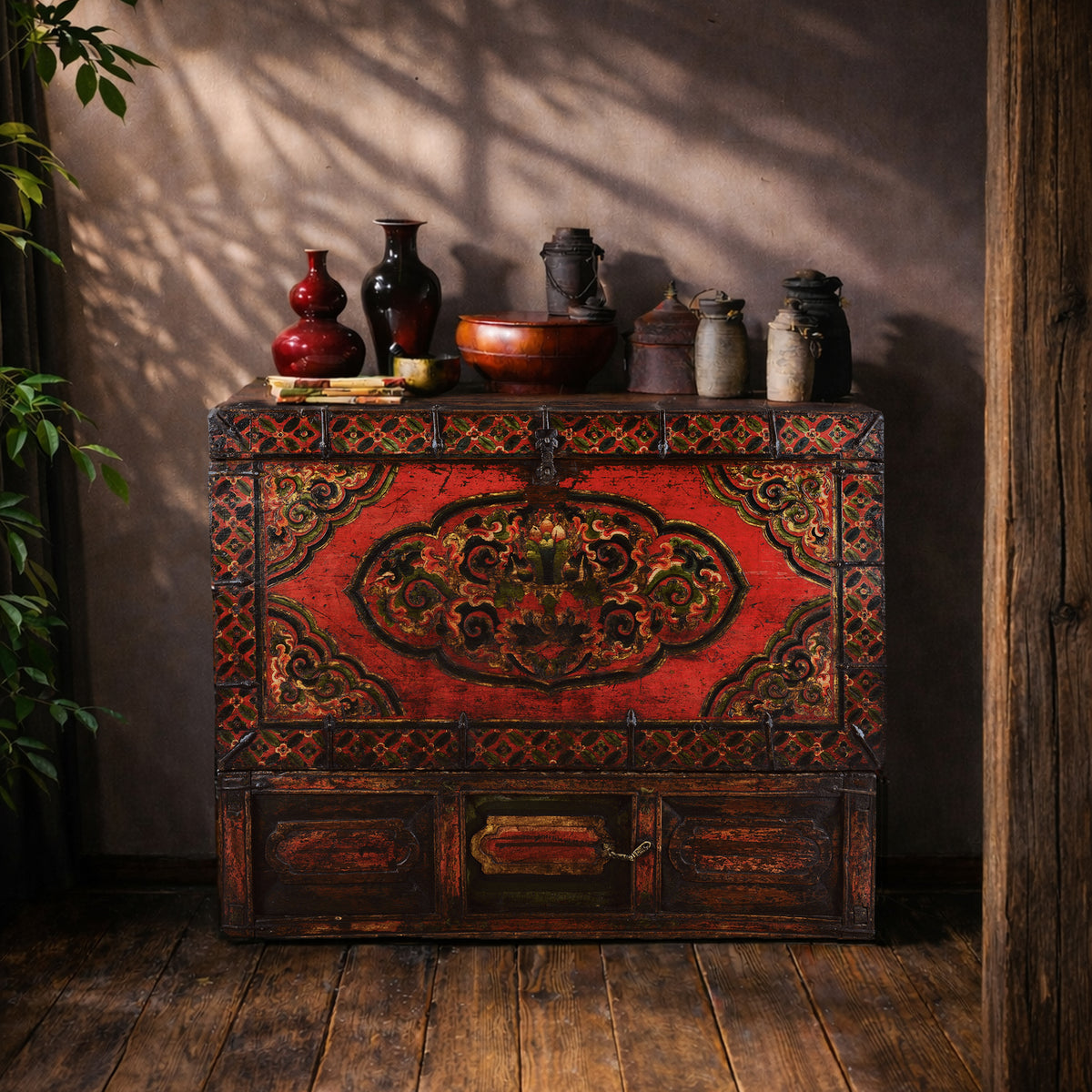 Decorative Eighteenth Century Central Tibetan Monastic Chest With Three Jewels Motif And Original Stand | Indigo Antiques
