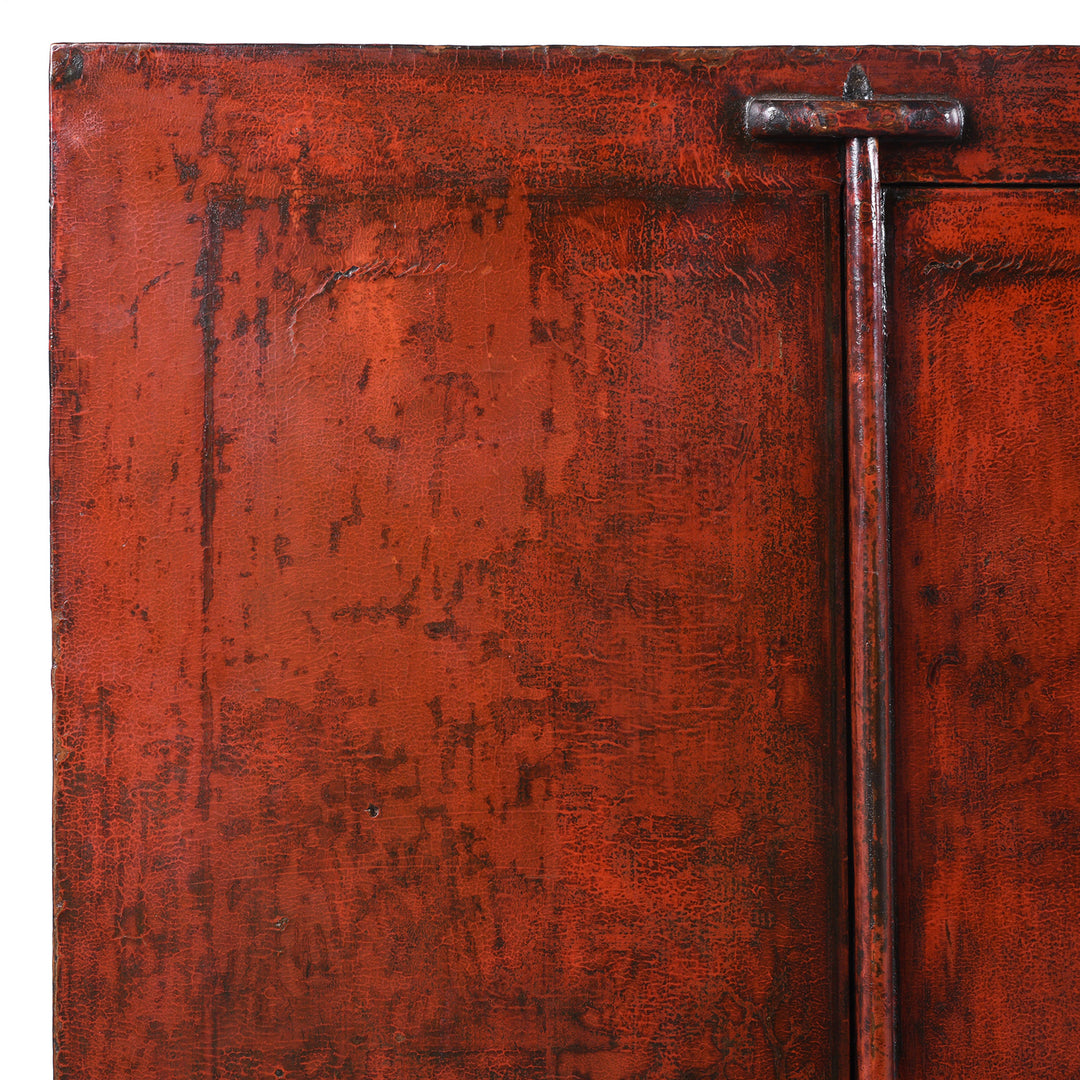 Corner Detail From Antique 19th Century Qing Dynasty Shanxi Red Lacquer Wedding Cabinet In Original Peking Red With Brass Lock Plate | Indigo Antiques