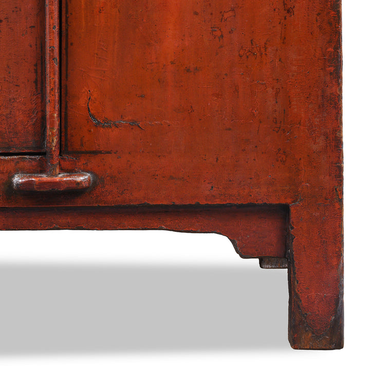 Leg detail From Antique 19th Century Qing Dynasty Shanxi Red Lacquer Wedding Cabinet In Original Peking Red With Brass Lock Plate | Indigo Antiques