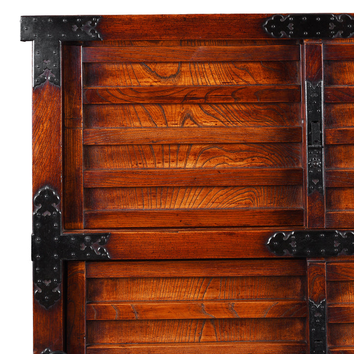 Corner And Wood Grain Detail From Japanese Edo Period Yonezawa Kuruma Dansu In Keyaki Wood With Urushi Lacquer Original Ironwork Sliding Doors Hidden Drawers And Wheels | Indigo Antiques