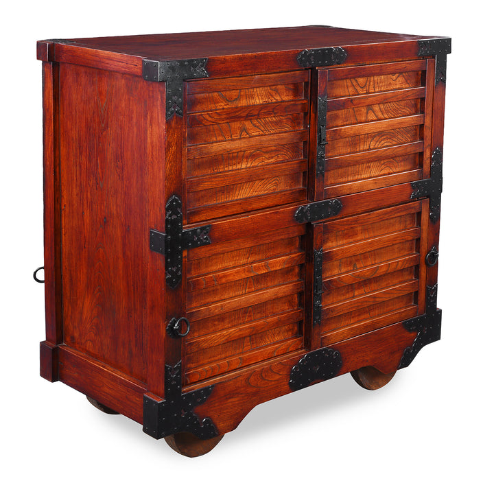 Anged View Of Japanese Edo Period Yonezawa Kuruma Dansu In Keyaki Wood With Urushi Lacquer Original Ironwork Sliding Doors Hidden Drawers And Wheels | Indigo Antiques