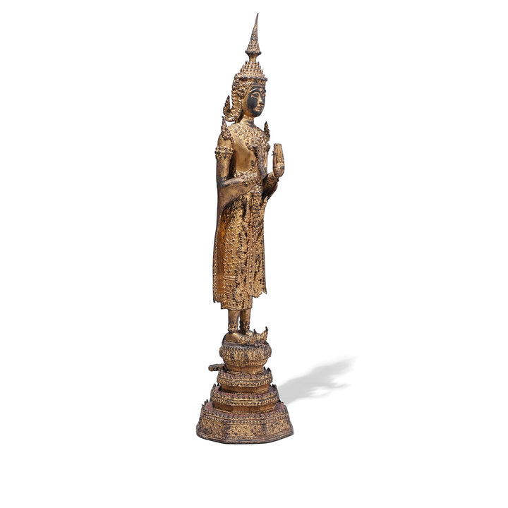 Angled VIew Of 19th Century Thai Gilt Bronze Buddha Figure From Rattanakosin Period Standing On Tiered Base