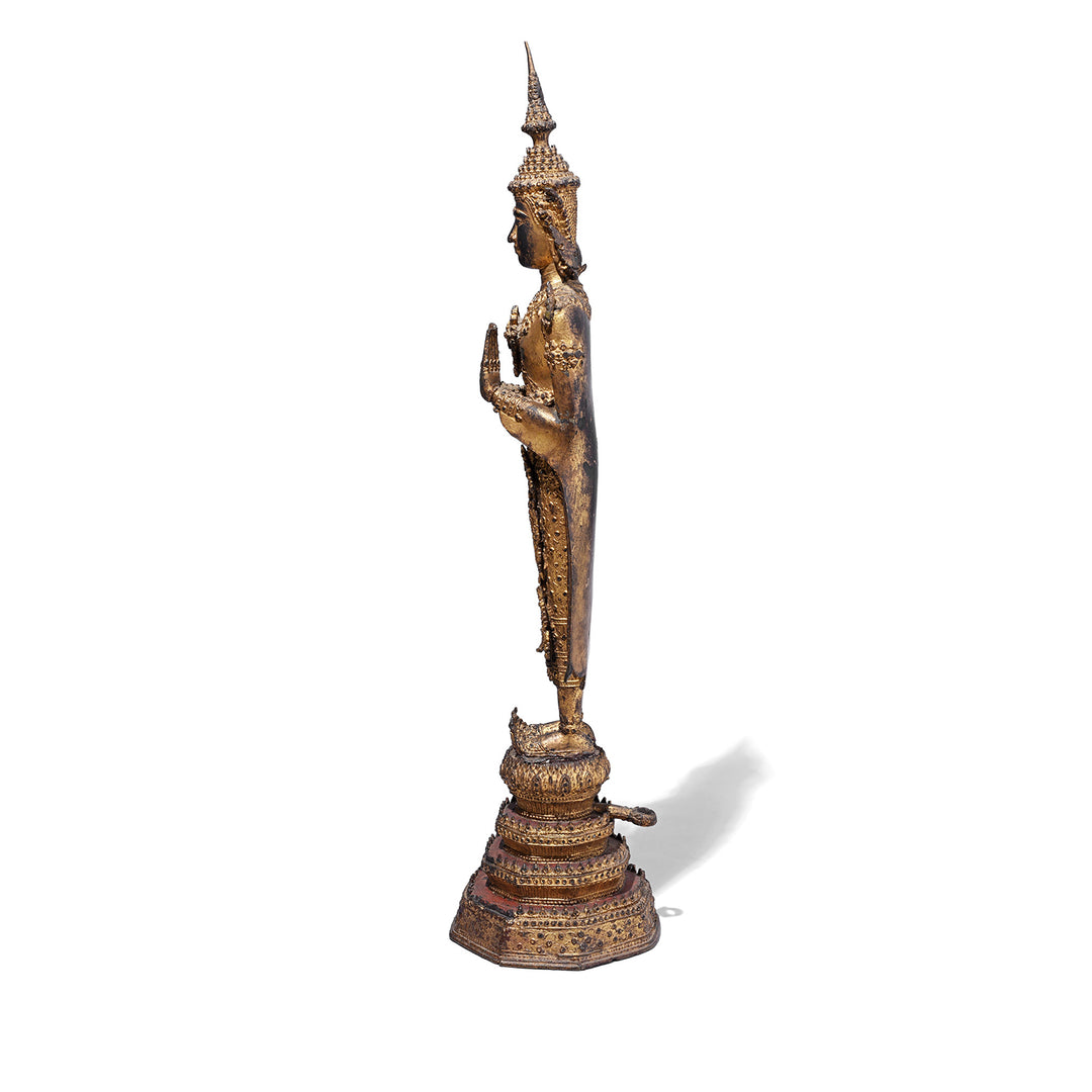 Side View Of 19th Century Thai Gilt Bronze Buddha Figure From Rattanakosin Period Standing On Tiered Base