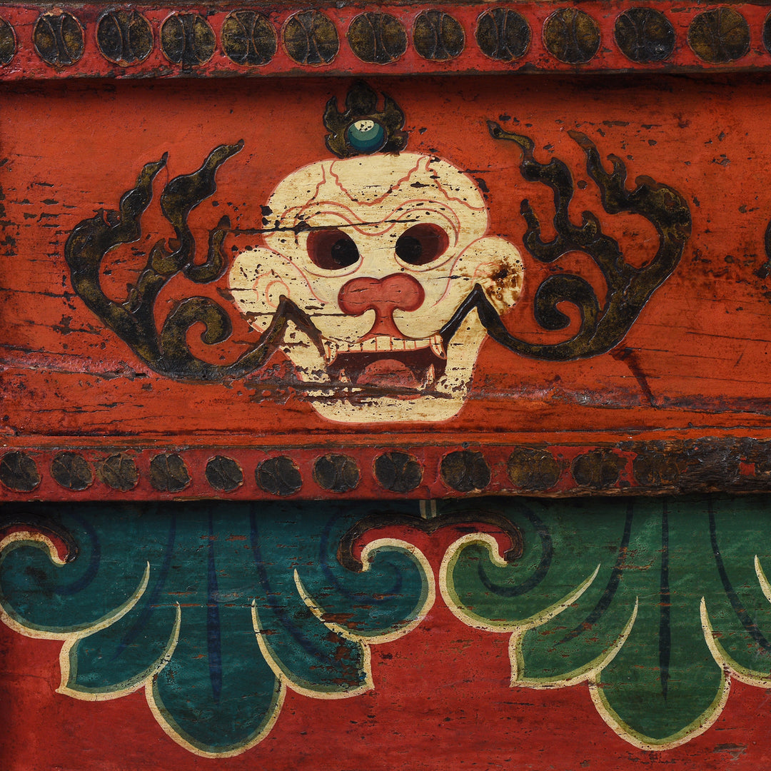 Skull Detail From 19th Century Painted Tibetan Torgam Cabinet With Hand Painted Snow Lions Protective Buddhist Motifs And Original Interior Shelf | Indigo Antiques