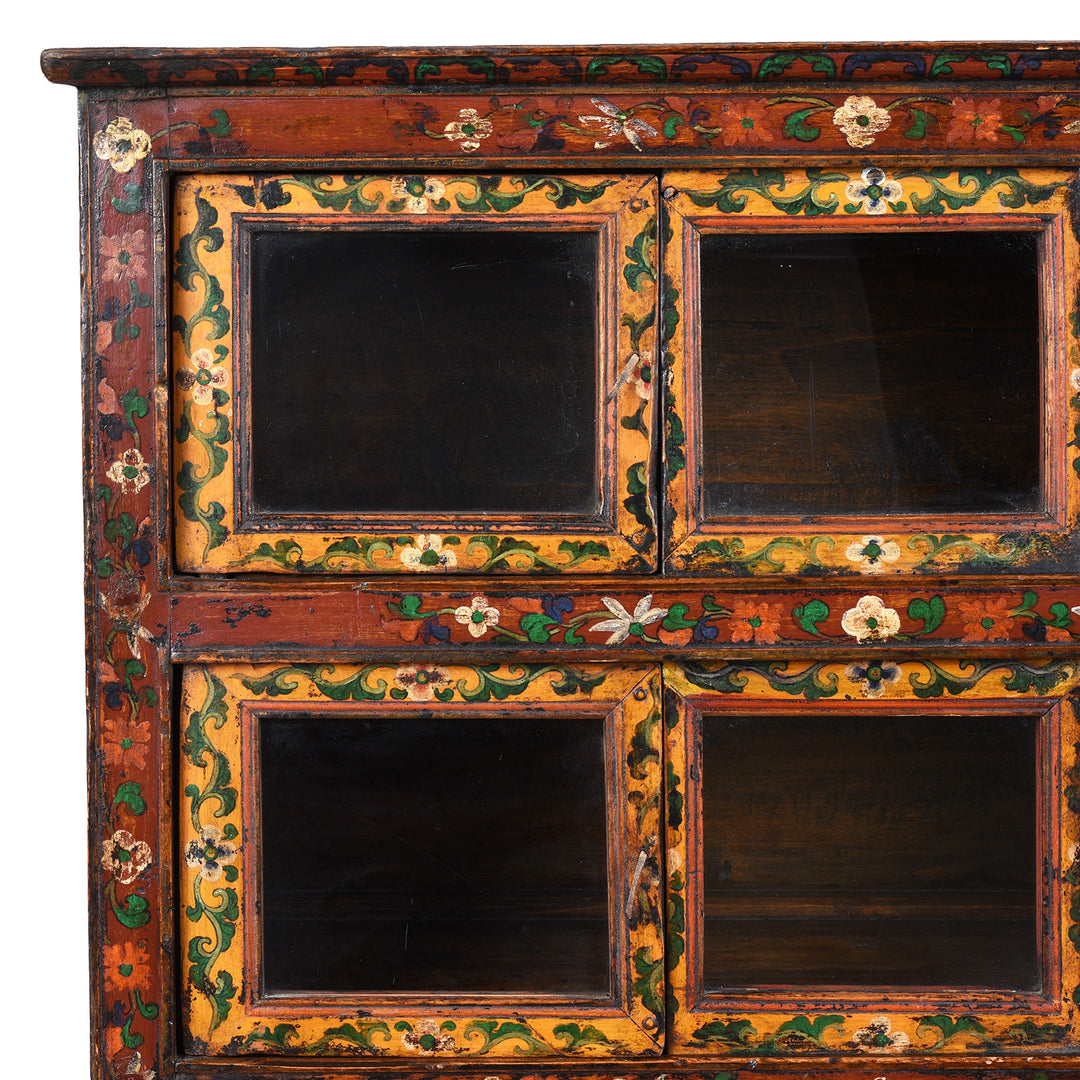 Corner Detail Showing Artwork On Antique Glazed Painted Tibetan Cabinet | Indigo Antiques