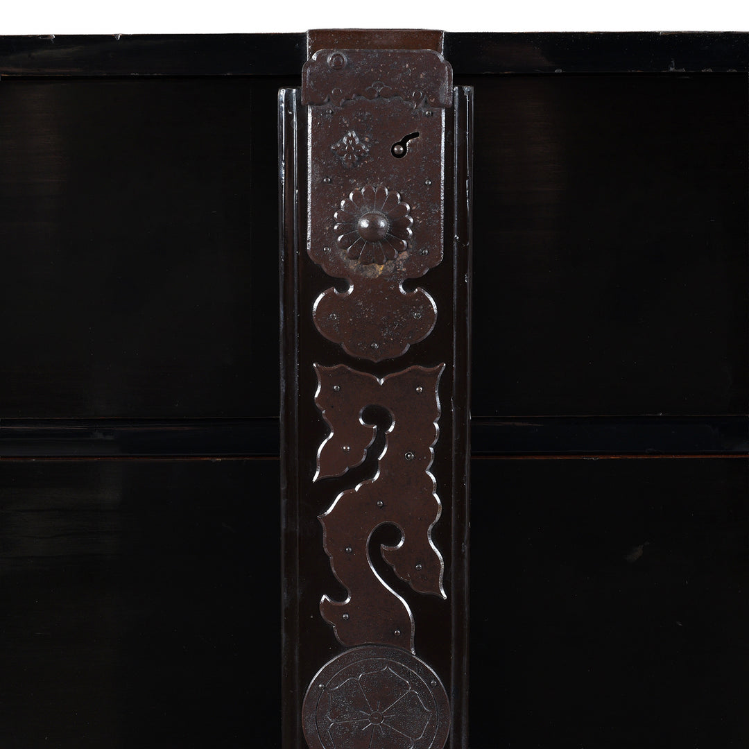 Bow locking Plate Detail From Late Meiji Period Japanese Shōnai Bo-Dansu Kiri Wood Merchant's Chest With Black Lacquer Finish Hand Forged Iron Fittings Hidden Drawers And Original Locking Bar | Indigo Antiques