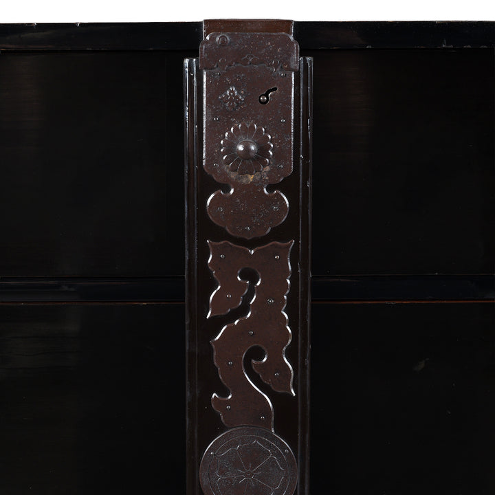 Bow locking Plate Detail From Late Meiji Period Japanese Shōnai Bo-Dansu Kiri Wood Merchant's Chest With Black Lacquer Finish Hand Forged Iron Fittings Hidden Drawers And Original Locking Bar | Indigo Antiques