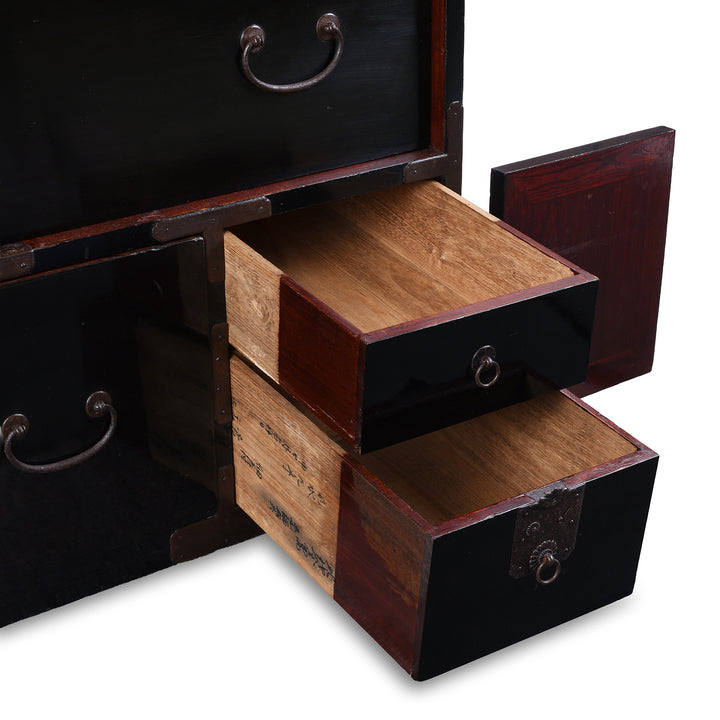 Lower Drawers Detail From Late Meiji Period Japanese Shōnai Bo-Dansu Kiri Wood Merchant's Chest With Black Lacquer Finish Hand Forged Iron Fittings Hidden Drawers And Original Locking Bar | Indigo Antiques