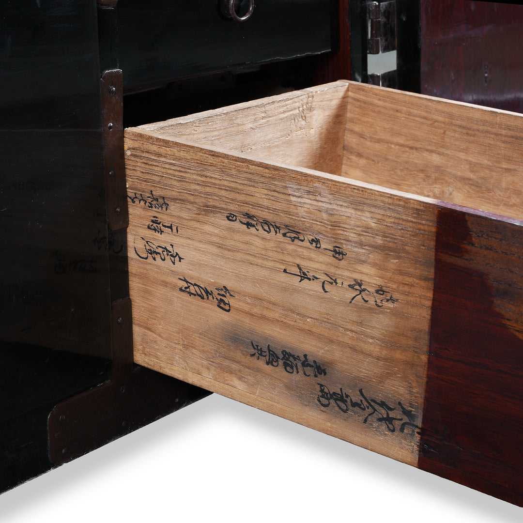 Drawer Text Detail From Late Meiji Period Japanese Shōnai Bo-Dansu Kiri Wood Merchant's Chest With Black Lacquer Finish Hand Forged Iron Fittings Hidden Drawers And Original Locking Bar | Indigo Antiques