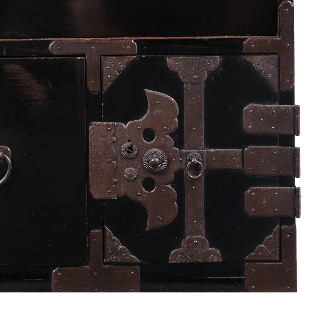 Door Detail From Late Meiji Period Japanese Shōnai Bo-Dansu Kiri Wood Merchant's Chest With Black Lacquer Finish Hand Forged Iron Fittings Hidden Drawers And Original Locking Bar | Indigo Antiques