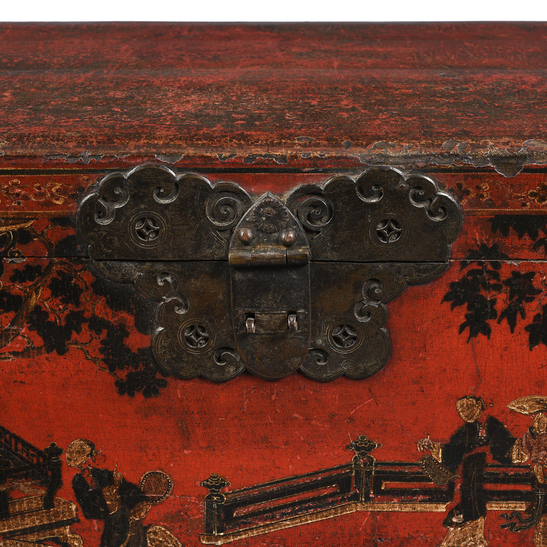 Brass hardware detail with coin designs on a beautiful red lacquered antique Chinese chest from Shanxi province - 18th century