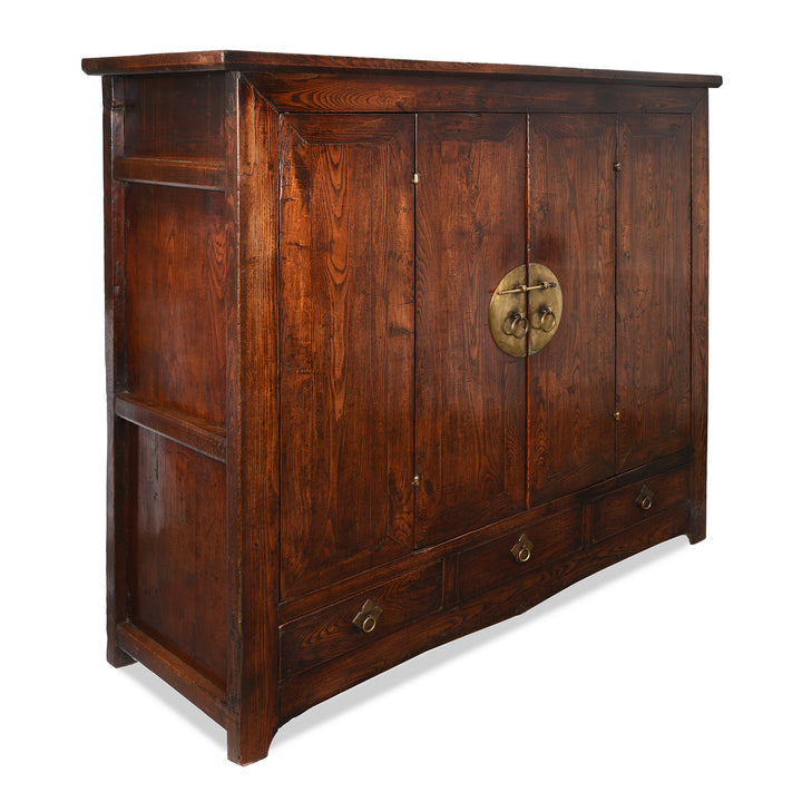 Angled View Of Antique Elm Wardrobe Cabinet From Gansu - 19th Century | Indigo Antiques