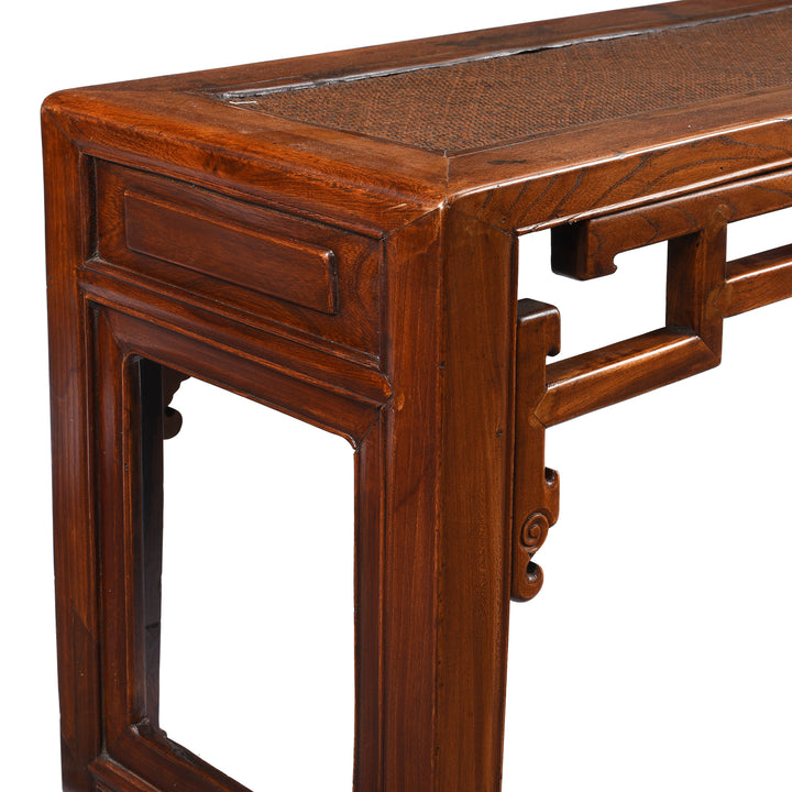 Corner detail From Antique Red Elm Bench From Jiangsu With Rattan Seat - 19th Century | Indigo Antiques