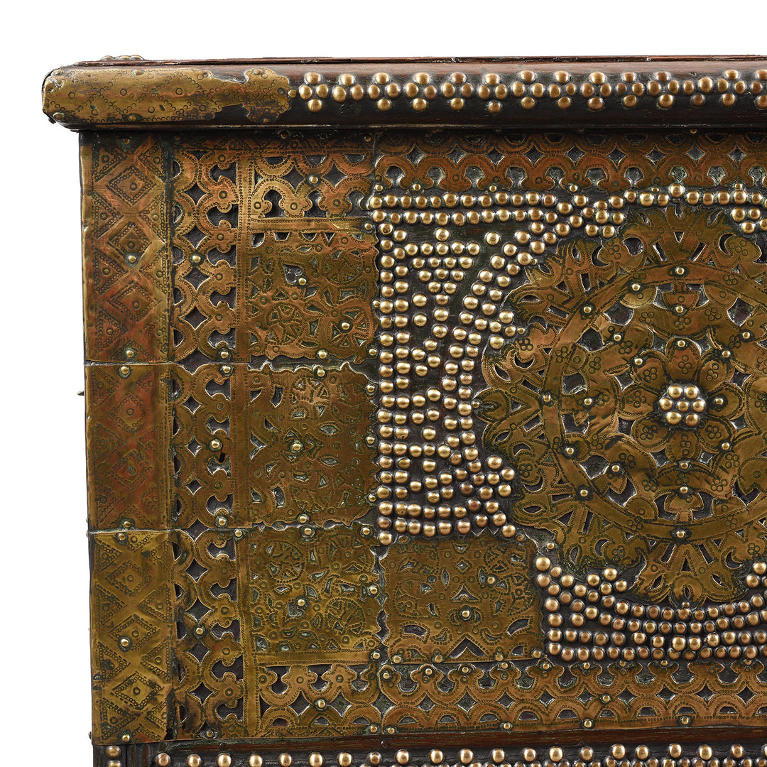 Corner detail from an Antique Brass Studded Teak Zanzibar Chest From Surat in Gujarat | Indigo Antiques