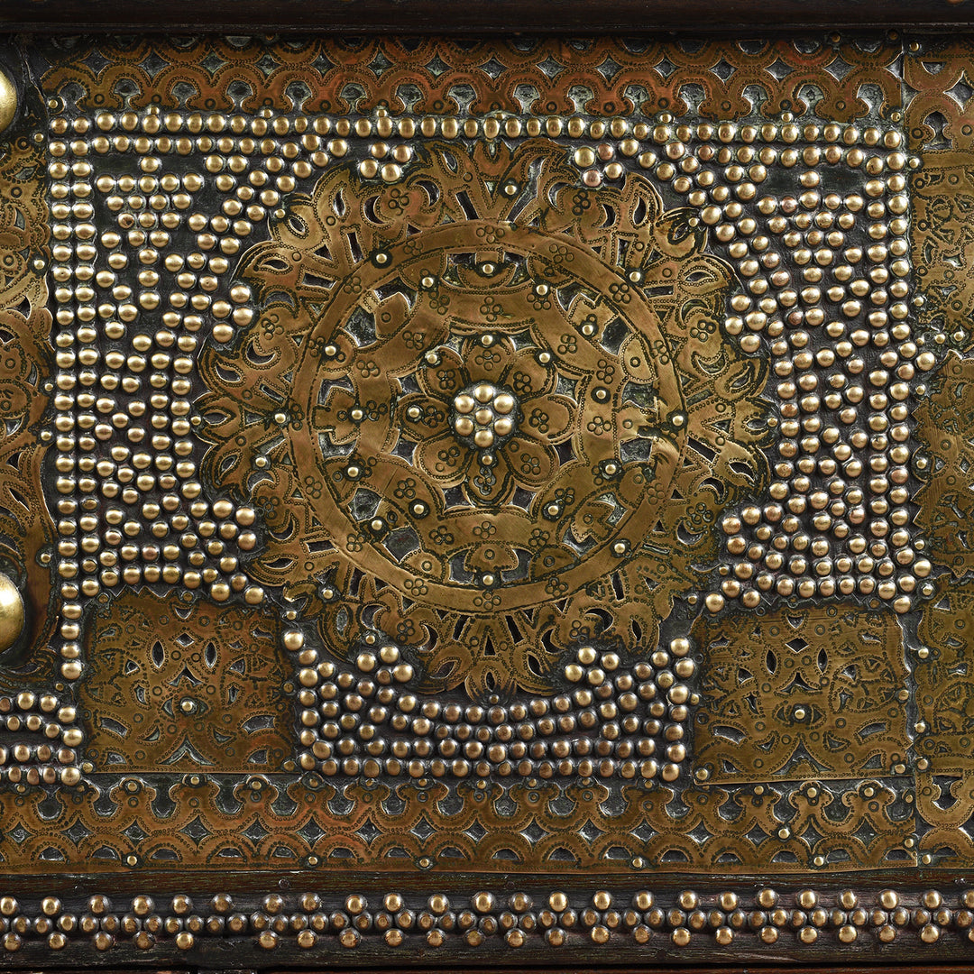 Front detail from an Antique Brass Studded Teak Zanzibar Chest From Surat in Gujarat | Indigo Antiques