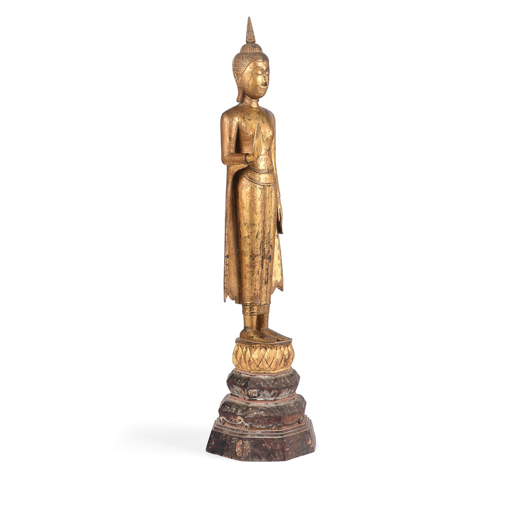 Angled View Of Antique Antique Gilt Teak Sukothai Style Standing Buddha from Thailand | Indigo Antiques