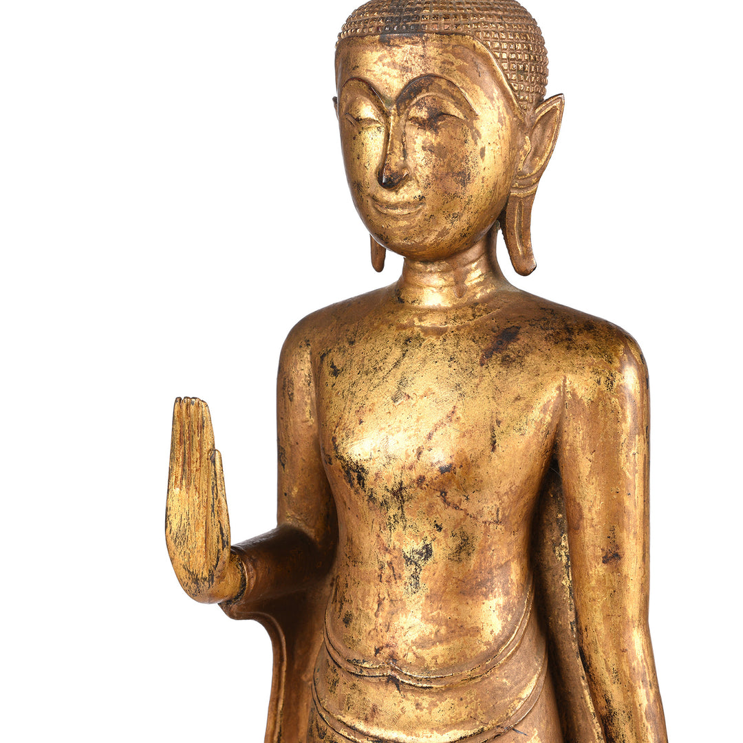 Angled Detail From Antique Antique Gilt Teak Sukothai Style Standing Buddha from Thailand | Indigo Antiques