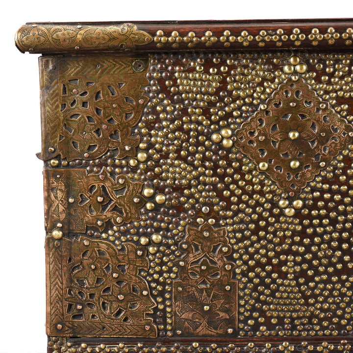 Corner Detail From Antique Brass Studded Teak Zanzibar Chest From Surat | Indigo Antiques