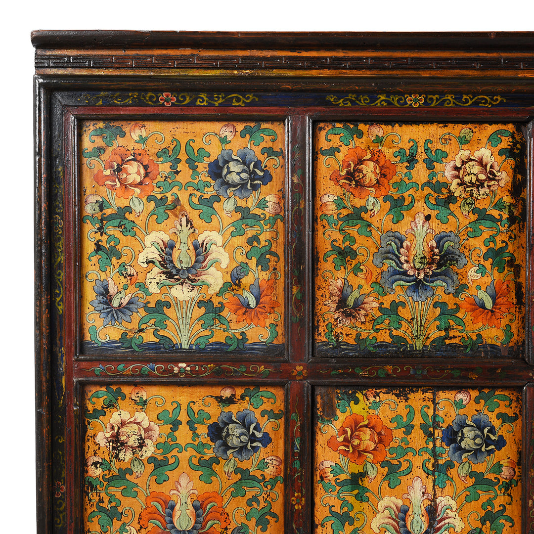 Corner Detail Showing Paintwork On Upper Panel From Antique Painted Tibetan Cabinet With Original Paint | Indigo Antiques
