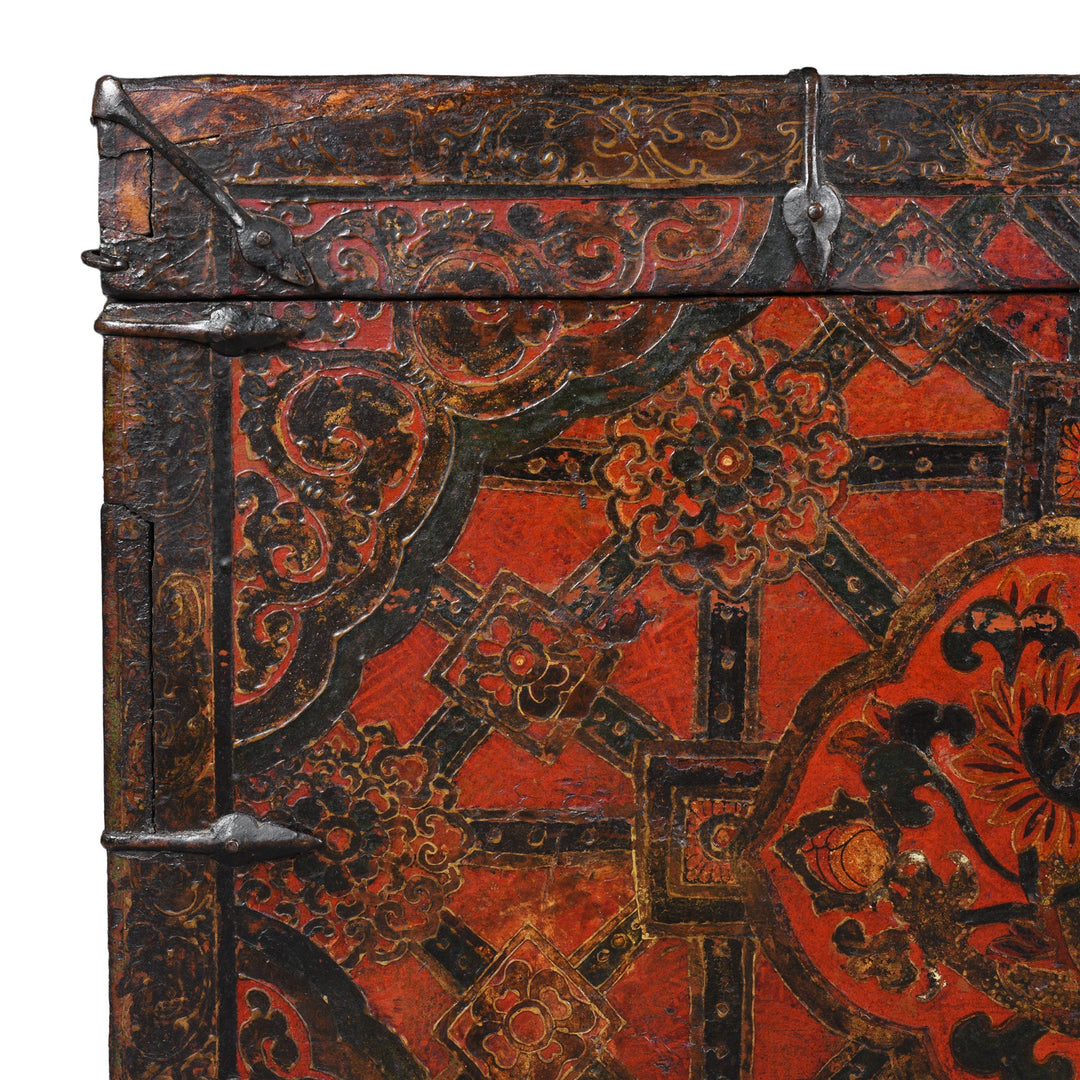 Corner Detail From Antique Tibetan Painted Storage Chest With Red And Gold Floral Motif And Central Dragon Design