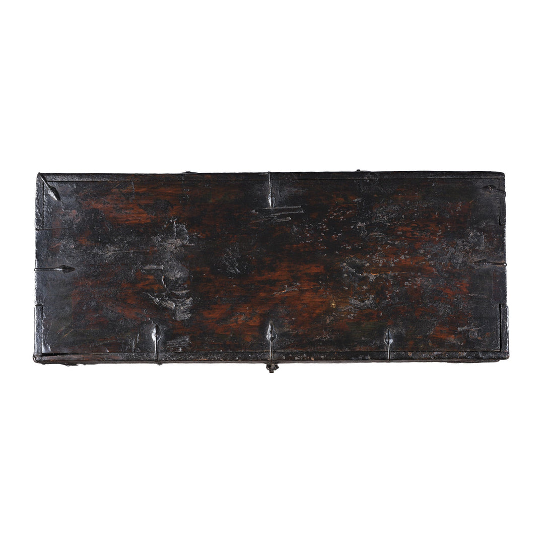 Top Down View Of Antique Tibetan Painted Storage Chest With Red And Gold Floral Motif And Central Dragon Design