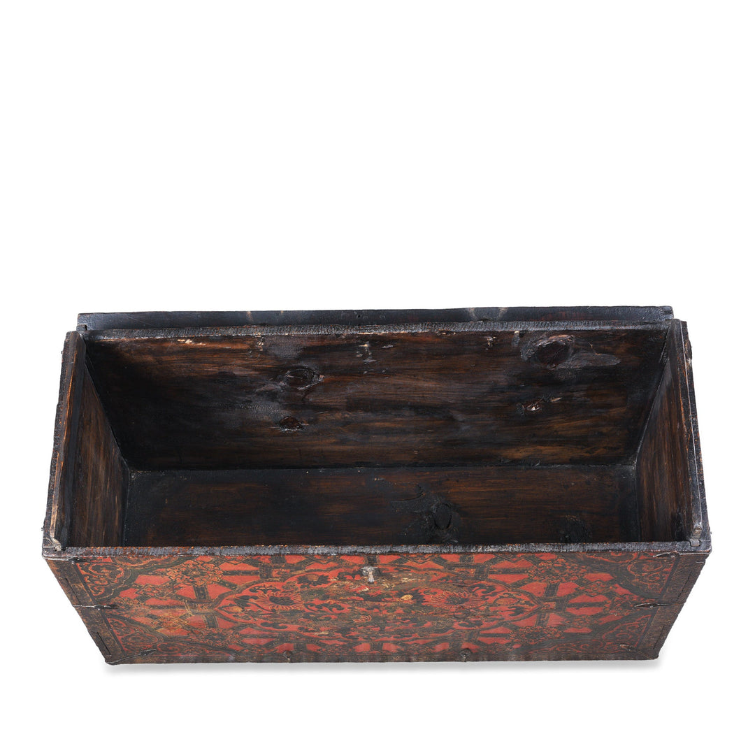 Interior View Of Antique Tibetan Painted Storage Chest With Red And Gold Floral Motif And Central Dragon Design