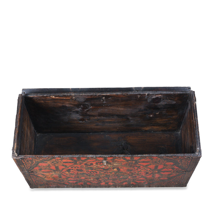 Interior View Of Antique Tibetan Painted Storage Chest With Red And Gold Floral Motif And Central Dragon Design