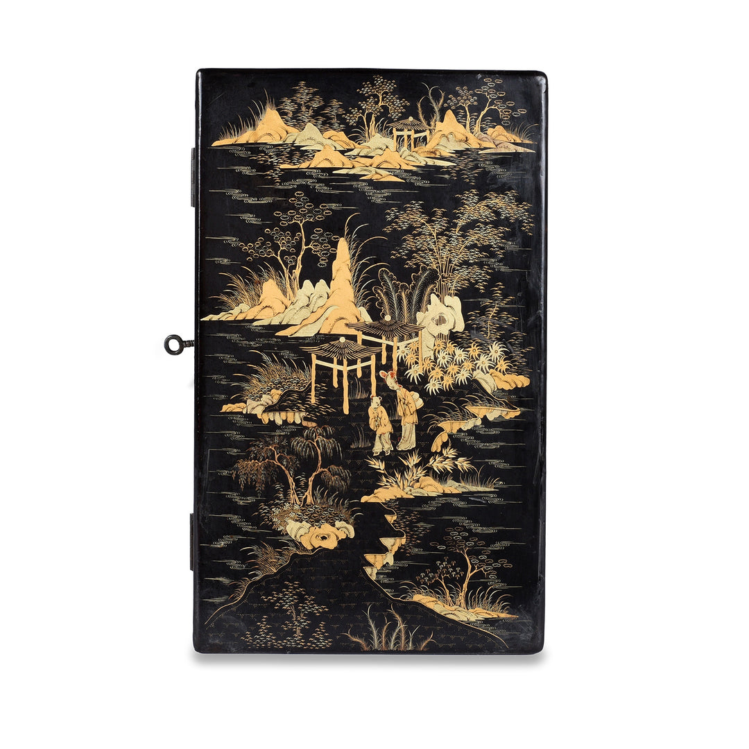 Side View Of Gilt Black Lacquer Chinoiserie Table Cabinet With Ivory Handles And Painted Landscape Scenes