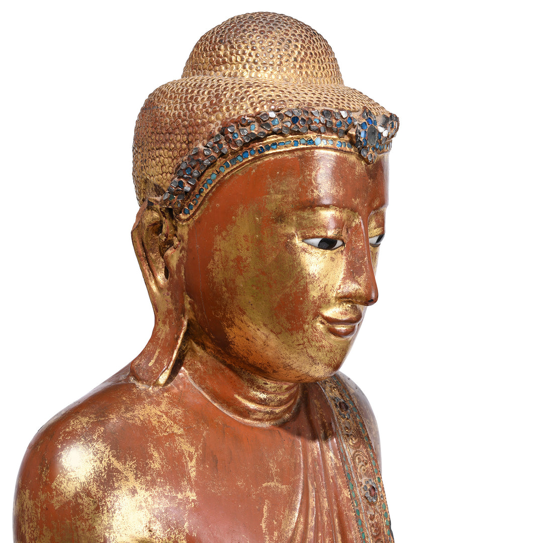 Face Detail From Gilded Teak Standing Mandalay Buddha From Burma With Inlaid Glass And Myrobalan Fruit
