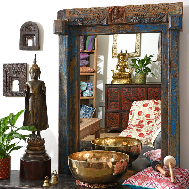 Antique Indian mirror with a Tibetan altar cabinet reflection | Indigo Antiques