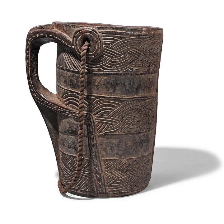 Nepalese Carved Wooden Milk Jar With Geometric Banding Rope Strap And Integrated Handle Early 20th Century