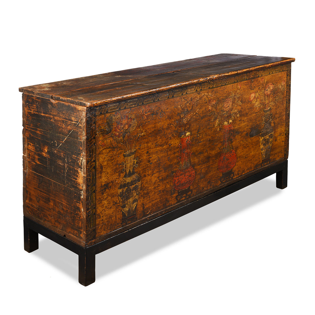 Angled VIew Of Antique Mongolian Chest With Original Paint On New Stand | Indigo Antiques
