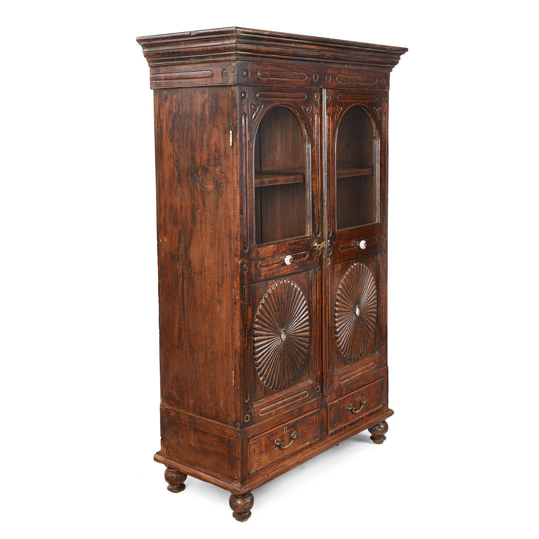 Angled VIew Of Antique Teak Almirah Cabinet With Sunburst Panels | Indigo Antiques