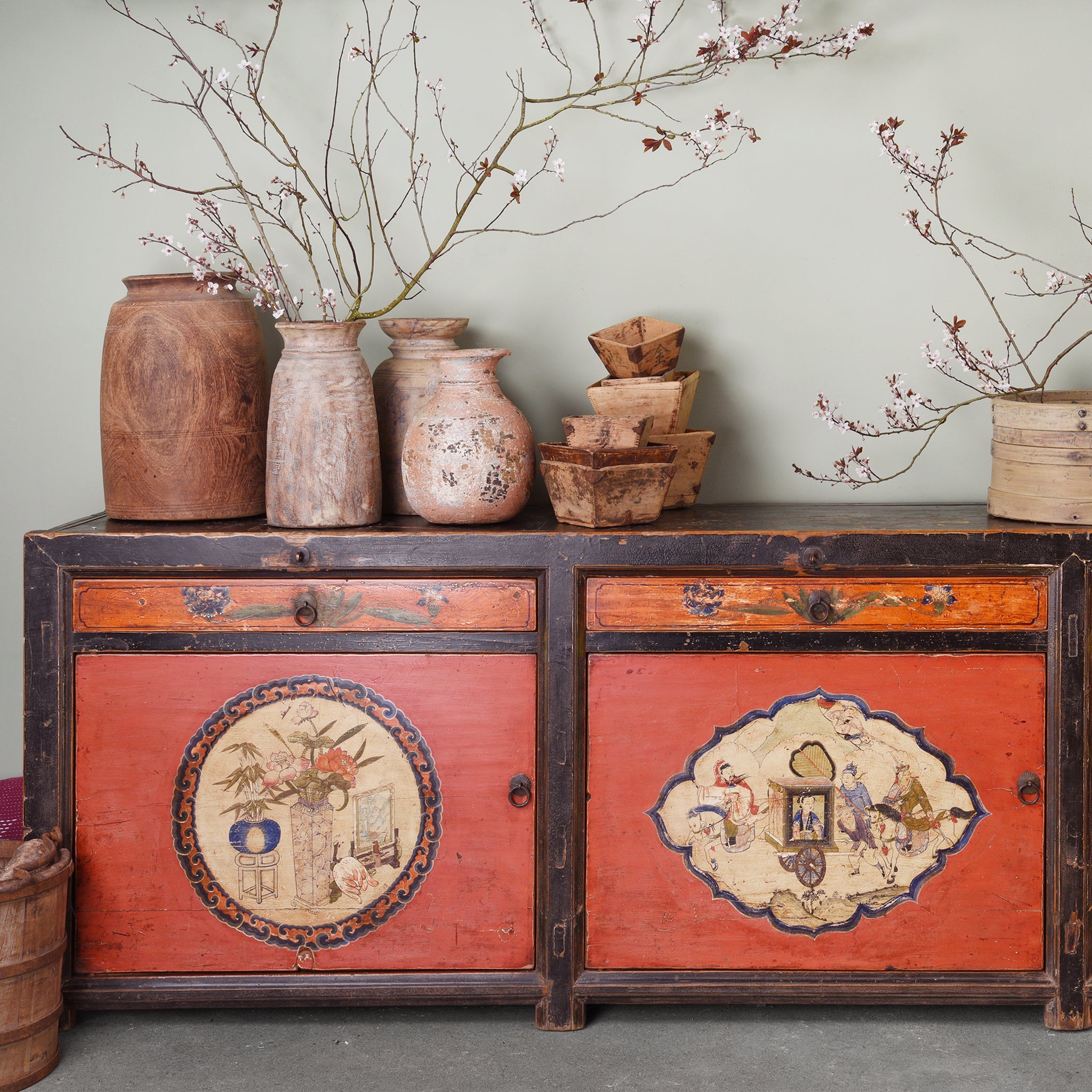 Chinese red sideboard with wooden decorations