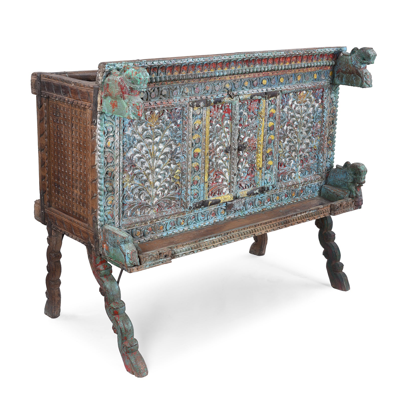 Angled View Of Antique Gujarati Majus Dowry Chest With Painted Floral Carving And Horse Head Finials