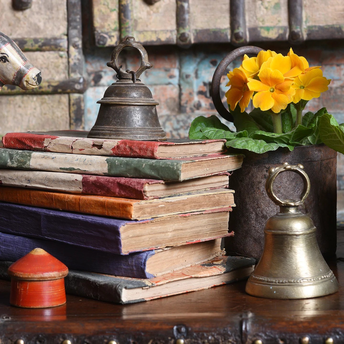 Bells on a stack of old books