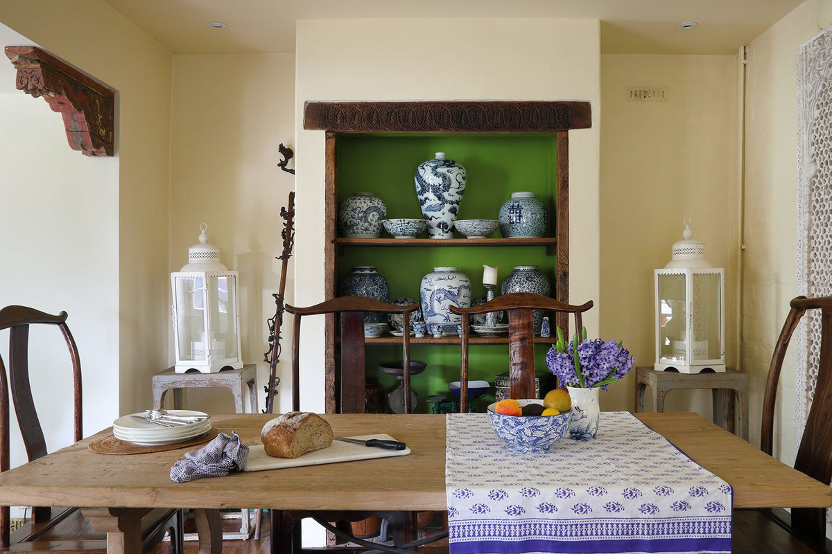A rustic bleached elm dining table with Chinese blue and white porcelain - ustic antique farmhouse dining tables made from reclaimed wood.