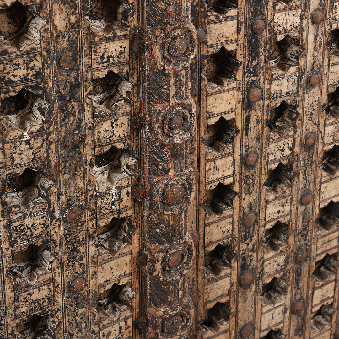 Angled View Of Antique Mughal Style Carved Indian Door - 18thC | INDIGO ANTIQUES