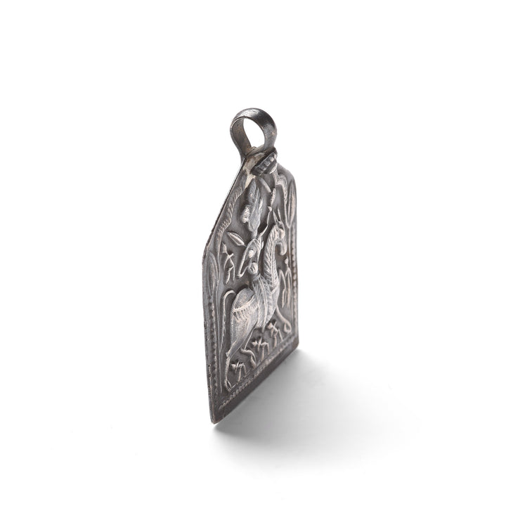 Angled VIew Of Old Tribal Silver Amulet - from Rajasthan - 19thC | Indigo Antiques