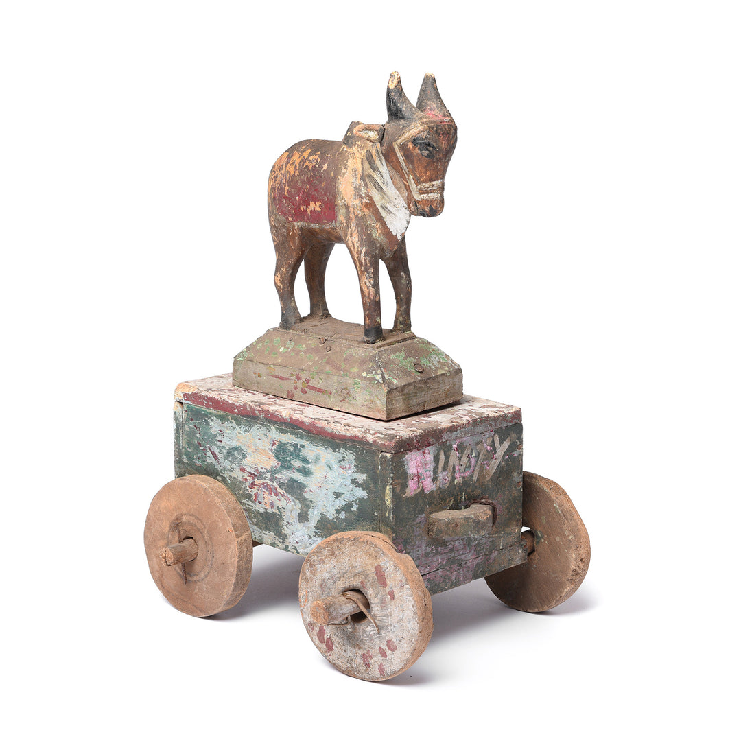 Angled View Of Painted Indian Nandi Bull Wheel Toy From Rajasthan - Ca 1940 | Indigo Antiques