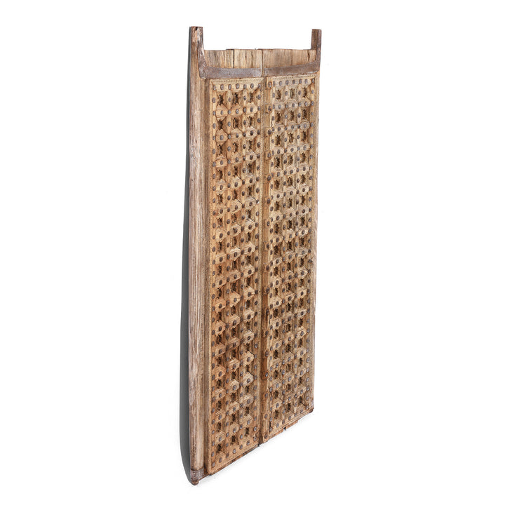 Angled View Of Antique Carved Sun Bleached Window Shutters From Punjab - 18th Century | Indigo Antiques