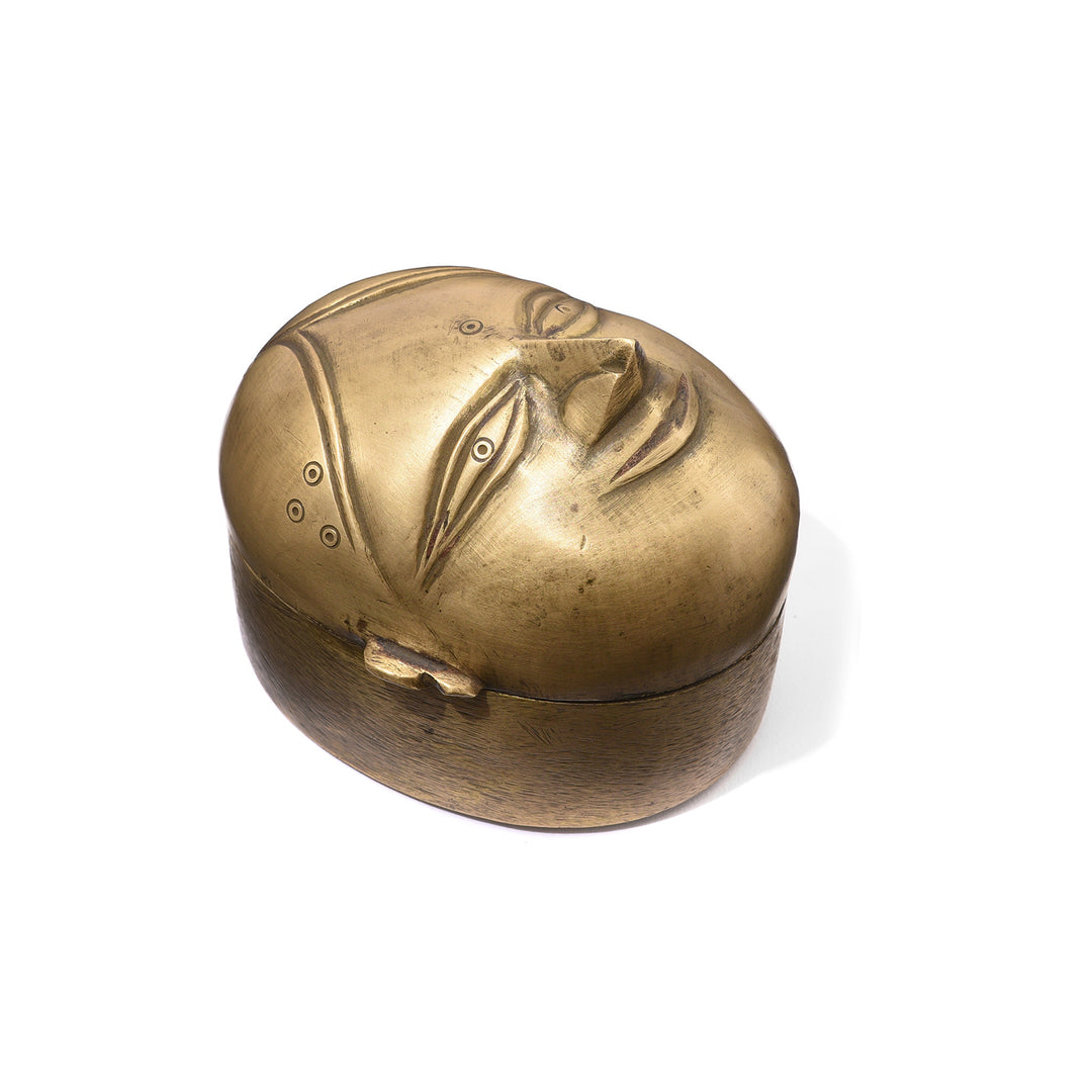 Angled VIew Of Antique Brass Gauri Head Betelnut Box - 19th Century | Indigo Antiques